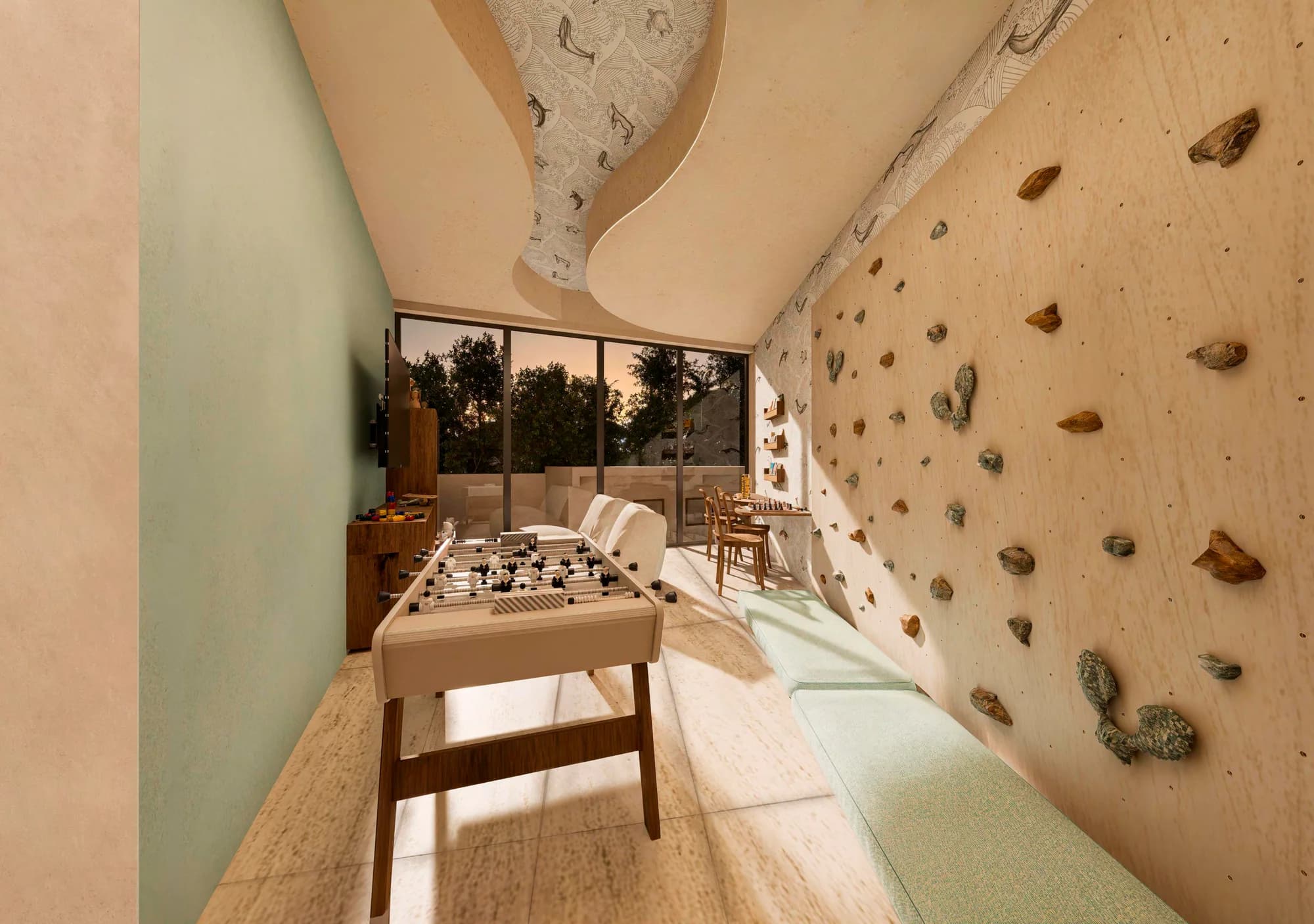 Kids’ Zone with play tables, seating and a climbing wall
