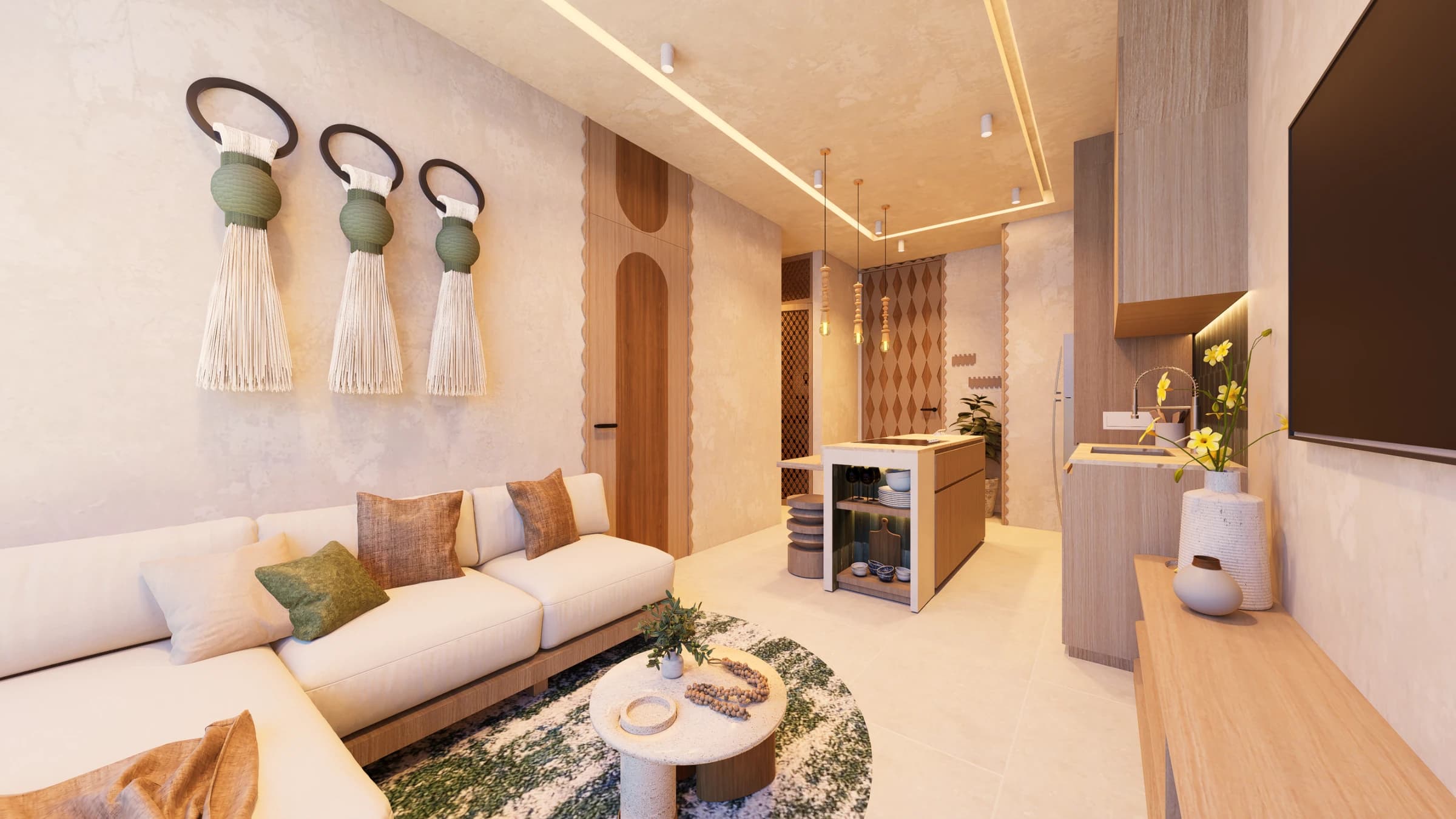 Living area and open kitchen in a one-bedroom Nayari residence