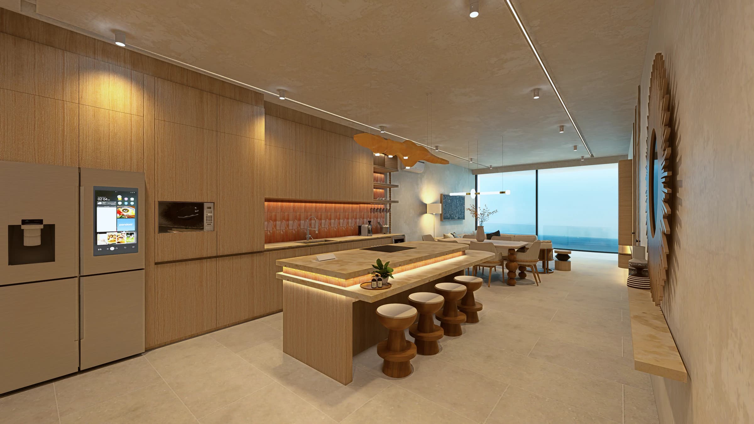 Entry view through a two-bedroom kitchen toward the living area and ocean beyond