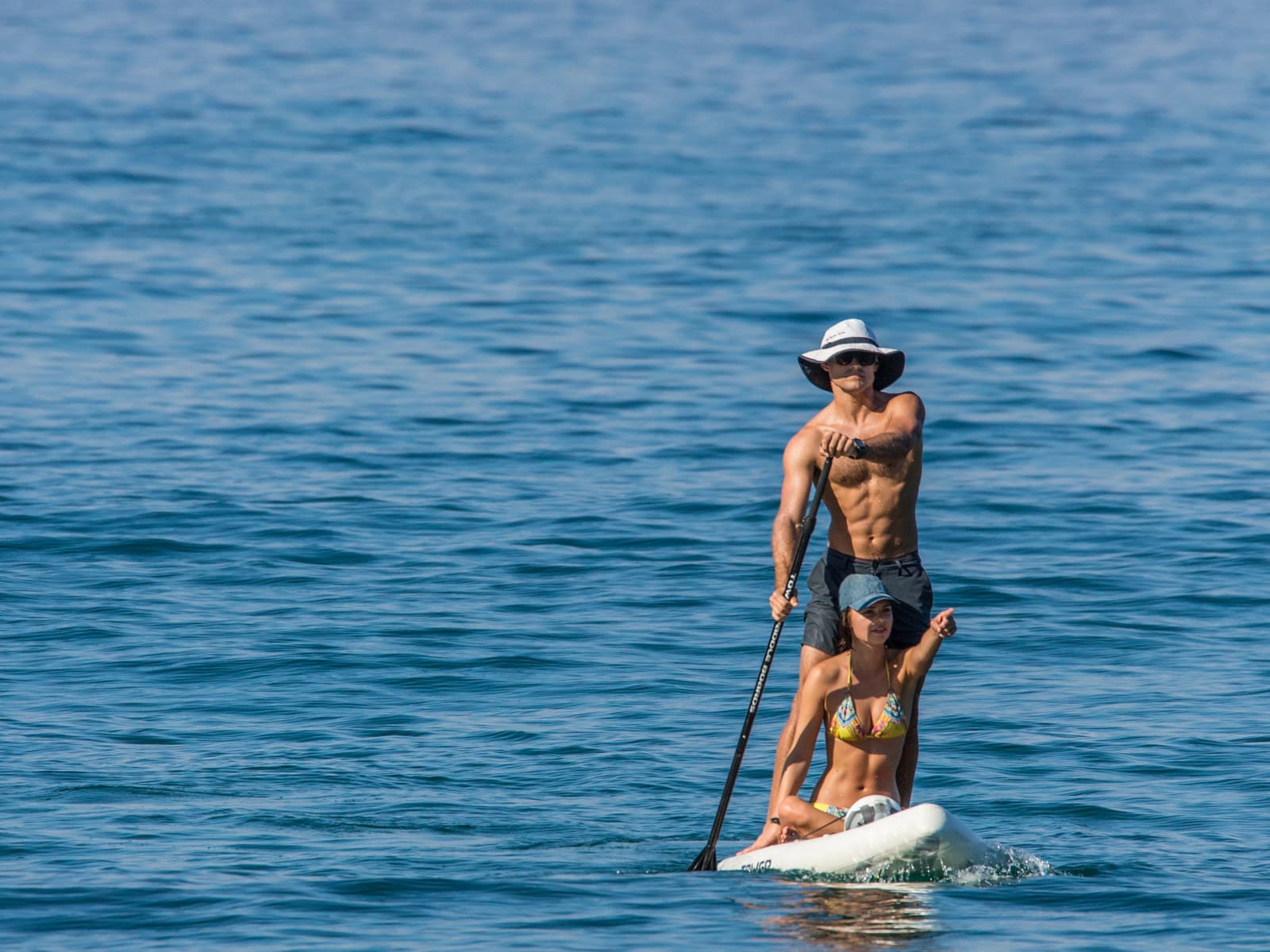 Paddleboarders moving across the Pacific near Sayulita